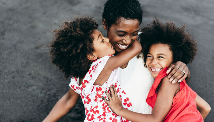 a mother and her two young children